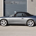 Porsche 911 type 996 Carrera 2 Cabriolet 3.6 320 ch — profil avec capote