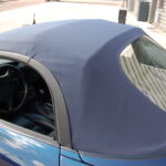Porsche Boxster 986 2.5 204 ch — boîte manuelle — capote, vue latérale