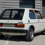 Volkswagen Golf 1 GTI 1800 DX — vue trois-quarts arrière opposée