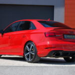 Audi RS3 Berline 2.5 TFSI 400 ch Quattro S tronic — vue trois-quarts arrière opposée
