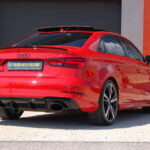 Audi RS3 Berline 2.5 TFSI 400 ch Quattro S tronic — vue trois-quarts arrière opposée