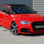 Audi RS3 Berline 2.5 TFSI 400 ch Quattro S tronic — vue trois-quarts avant opposée