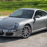 Porsche 911 type 997 Carrera S 3.8 355 ch Tiptronic S — vue trois-quarts avant
