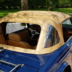 Triumph TR6 2.5 — Triple carburateurs — 1973 — capote, vue trois-quarts