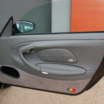 Porsche 911 type 996 Carrera 3.4 300 ch — contre-porte passager