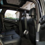 Porsche Cayenne S V6 3.0 Diesel 262 ch Tiptronic — habitacle avant, vue latérale