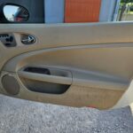 Jaguar XK Coupé V8 4.2 306 ch BVA6 — contre-porte passager