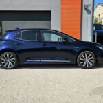 Toyota Corolla 1,8 Hybride 122 ch Design — profil opposé