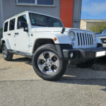 Jeep Wrangler Unlimited Sahara V6 3.6 285 ch Pentastar BVA — vue trois-quarts avant