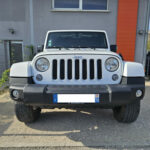 Jeep Wrangler Unlimited Sahara V6 3.6 285 ch Pentastar BVA — vue de face