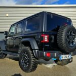 Jeep Wrangler Unlimited Rubicon 4xe 2.0 T 380 ch PHEV BVA8 — vue trois-quarts arrière opposée