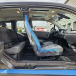 BMW i3S 184 ch 120 Ah iLife Atelier — habitacle avant côté conducteur