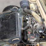 AM General Humvee M-1038 — Cargo / Transport de troupes — compartiment moteur
