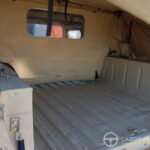AM General Humvee M-1038 — Cargo / Transport de troupes — espace cargo sous bâche