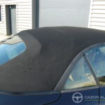 Porsche 911 type 997 Carrera 2 Cabriolet 3.6 325 ch BVM6 — capote, vue latérale