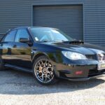 Subaru Impreza STI 9 DCCD — vue trois-quarts avant opposée