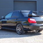 Subaru Impreza STI 9 DCCD — vue trois-quarts arrière opposée